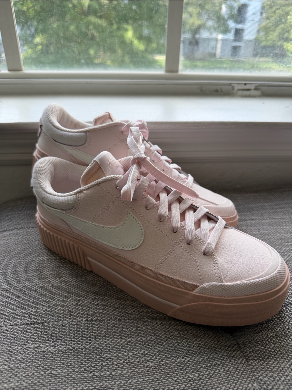 Nike Women’s Pale Pink Platform Sneakers with White Swoosh